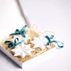 etoile-8-branches-deco-porcelaine-suspendre-sapin-noel-limoges-l-atelier-du-blanc